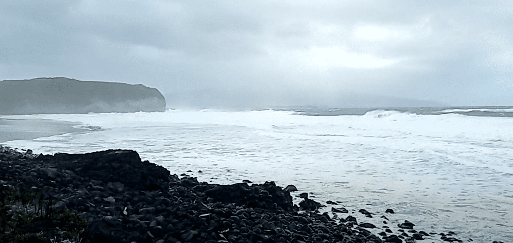 Surfing in São Miguel Island Azores volcanic coastline