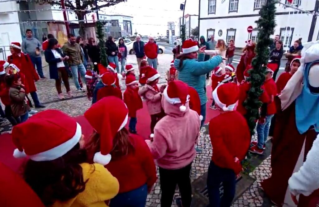 Children wearing Santa hats during Christmas celebration in São Miguel Azores
