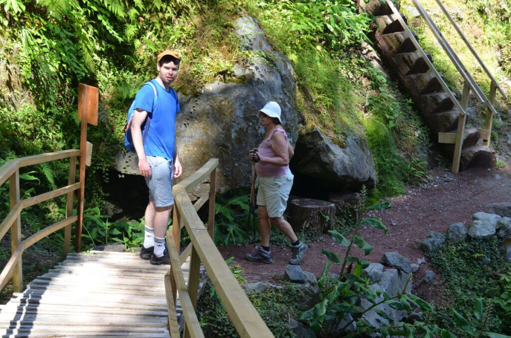 Walking inside Parque Grena Furnas lush forest São Miguel Azores